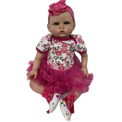 China Toy Hot Sell New American Toy In Pink Dress Wholesale Cartoon Reborn Baby Dolls Soft Silicone Girl Cotton Body Doll for sale