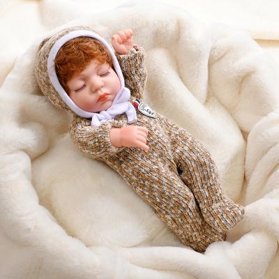 China Handmade Soft Curly Hair Mini Angel New Born Boy Dolls Changeable Dressing Silicone 12 Inches For Kids Cartoon Reborn Baby Toy for sale