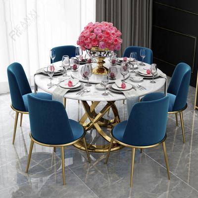 China Popular modern gold stainless steel dining table gold dining table set luxury wedding dining table luxury home furniture for sale