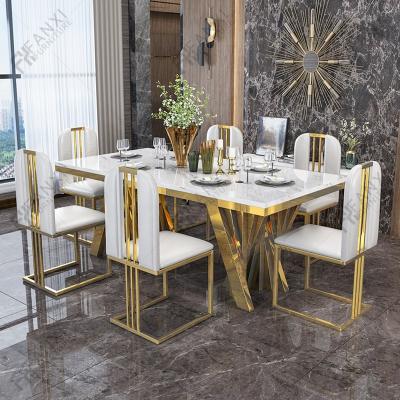 China Fanxi Factory Stainless Steel Dining Room Furniture Marble Luxury Dining Table Set 6 Seater Modern Italian Gold Metal Dining Tables For Sale for sale