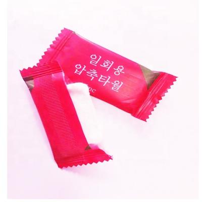 China Eco-Friendly Mini Candy Compressed Towel Portable Wholesale Biodegradable Soft and Comfortable Compressed Towel Factory Cloth Custom Logo for sale