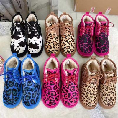 China Wholesale fashion trend leopard kids snow boots fashion Australia real wool one adult snow boots for sale