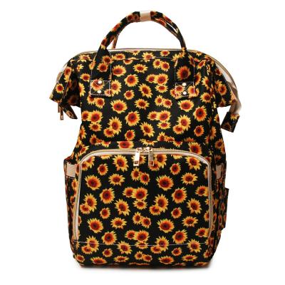 China Multifunctional Waterproof Sunflower Diaper Bag Large Capacity Diaper Bag Backpack for sale