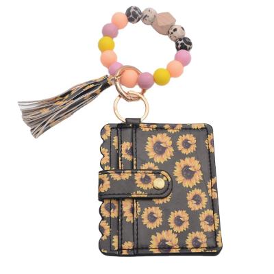 China Fashion Sunflower Bracelet Wrist Card Bag Personalized Beads Wracelet Card Holder for sale