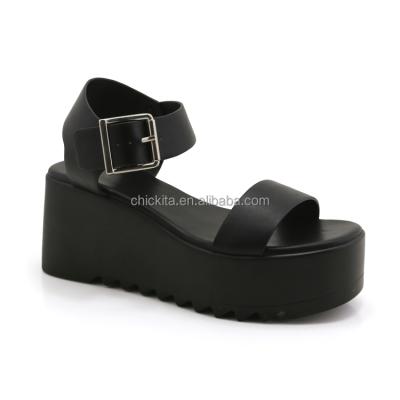 China Fashion trend black wedge outsole chunky woman sandal with big buckle for sale