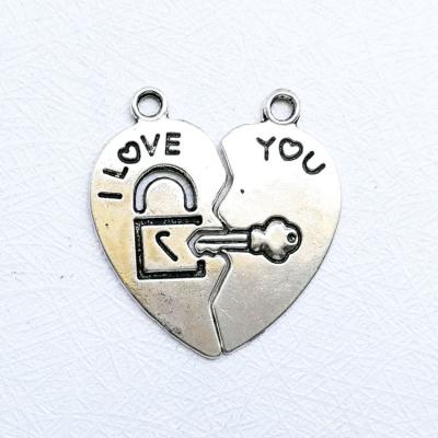 China Valentine Hot Sale Popular 2 Piece Couples Gift I Love You Stainless Steel Heart Key Lock Pendant for sale