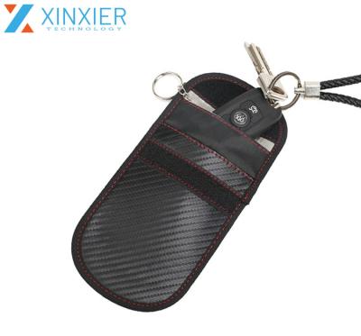 China Eco-friendly Black Color Carbon Fiber Signal Blocker Car Key Bag Anti-theft RFID Blocking Cage For Car Remote Keys for sale