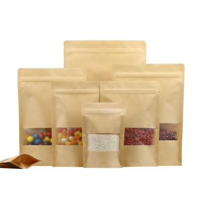 China Biodegradable plant ready to ship food grade on stock snack standup window ziplock brown kraft paper bag for sale