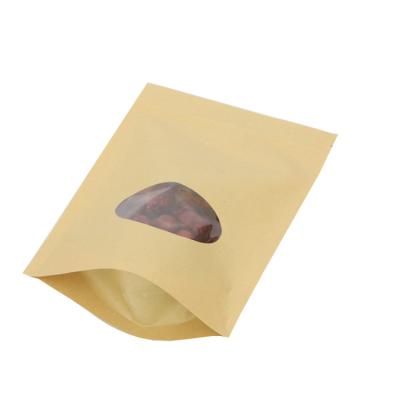 China Biodegradable Eco Friendly Cashew Cashew Nut Kraft Paper Clear Bag Stand Up Pouch for sale