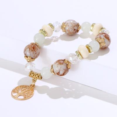 China New 2022 FASHIONABLE Amazon Natural Stone Acrylic Bracelet Women's Ceramic Beads Tree of Life Shaping Creative Bracelet Jewelry For Women for sale