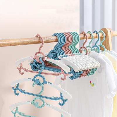 China Behind The Doors/On Walls MAIXI Cheap Clothes Rack Storage Drying Telescopic Folding Cloth Rack Hanger Simple Plastic Baby Windproof Wet Dry Children for sale