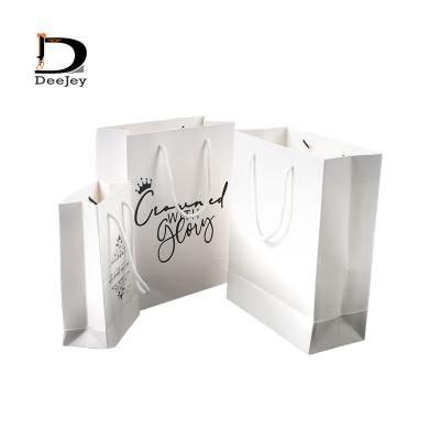 China Manufacturer Hot Sales Production Handmade Paper Bag Reusable Custom Printing Gift Luxury Hand Wrapping Paper Bag for sale