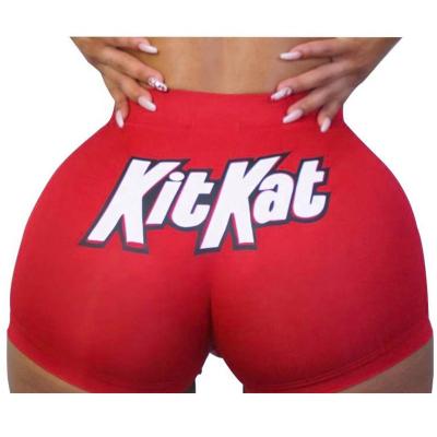 China Anti-Wrinkle Candy Logo Yoga Biker Booty Gym Shorts 2020 Summer High Waist Women Snickers Snack Shorts Plus Size Candy Printed Shorts Women for sale