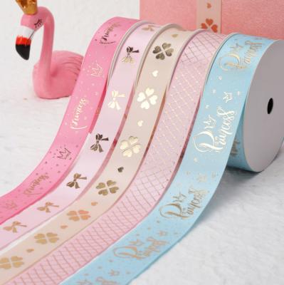 China Wholesale DIY 2.5 Graphics Polyester Ribbon GIF Florist Wrapping DIY Bronzing Ribbon Disposable for sale