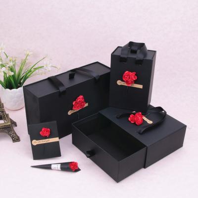 China Disposable Coke Mask Gift Box Drawer Handle Box Rectangular Perfume Box for sale