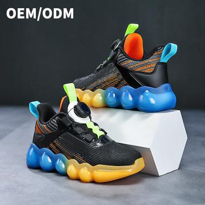 China Breathable New Design boys shoes 2023 spring and autumn new net surface medium children soft sole casual children's sports shoes for sale