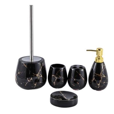 China Viable Wholesale Unique Home Design Black Luxury Gold Stripe Ceramic Hotel Accessory 5 Piece Bathroom Set for sale