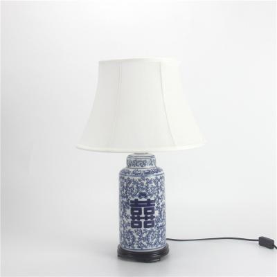 China Traditional warm luxury oriental porcelain table ceramic led decorative lamp blue and modern home office white for sale