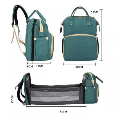 China Factory direct sales water resistant portable baby diaper bags for mothers with bed for sale