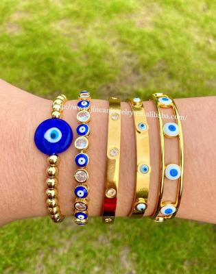 China Vintage Classic Blue Eyes 18K Gold Plated Diamond Beads Bracelet Set Gold Opening Adjustable Bracelet Wholesale Jewelry for sale