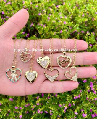 China Vintage 18k Gold Plated Heart Pendant Multiple Necklaces Fashion Pearl Animal Crystal Rhinestone Pendant Women Necklace for sale