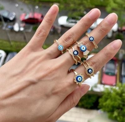 China CLASSIC Rhinestone Zircon Devil's Eye Ring Opening Adjustable Brass With Gold Plated Blue Eye Ring Set For Women for sale