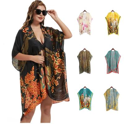 China Custom Wholesale Polyester Chiffon Wrap Shawls Sunscreen Floral Print Beach Cover Up Kimonos Tops Loose Casual Blouse For Women for sale