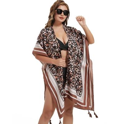 China Polyester Summer Leopard Chiffon Beach Blouse Mid Length Shawl With Tassel Bikini Sunscreen Blouse Cardigan Scarf for sale