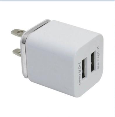 China Hot Selling Mobile Phone Tablet MP3 10W Adapter 2 - EU USB USA Charger 5V/1A Power Plug Bulk Charging Cube For iPhone Charger For Mobile Phone Longevity à venda