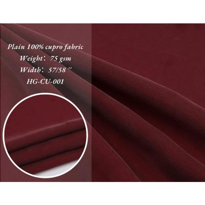 China Anti pill service 75gsm 75D free sample woven silky soft 100% single-dyed cupro fabric for pajamas for sale