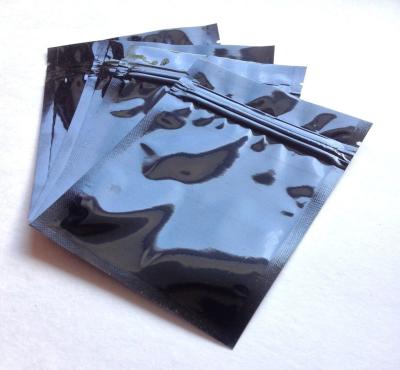 China Mini Small Black Aluminum Foil Packaging Bags Three Sides Sealded for sale