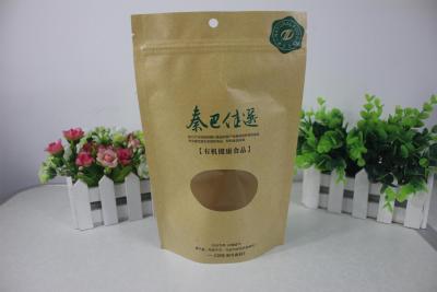 China Zippered Kraft Paper snack Stand Up Resealable Pouches with small clear window for sale