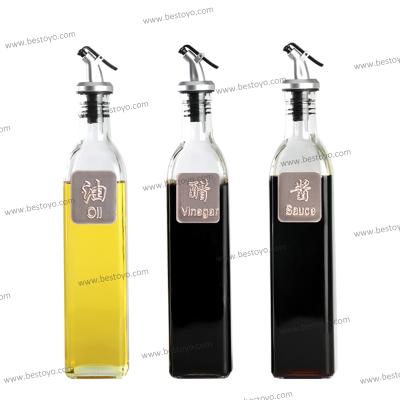 China Sustainable Glass Olive Oil Bottle With Leakproof Spout And Stainless Steel Label for sale