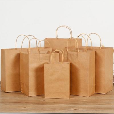 China Yiwu Wholesale Disposable Handbag Brown Kraft Paper Carry Bag for sale