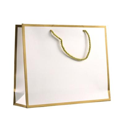 China Luxury Disposable Custom Paper Gold Edge Clothes Boutique Gift White Paper Shopping Bag for sale