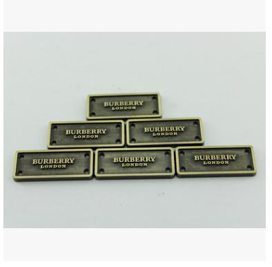 China Eco - Friendly Custom Letters Eco - Friendly Set Metal Gold Logo For Handbags for sale