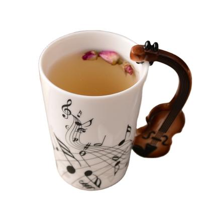 China Hot Selling Novelty Musical Instrument Art Ceramic Mug Cup Musical Note Style Coffee Milk Cup Christmas Gift Disposable Home for sale