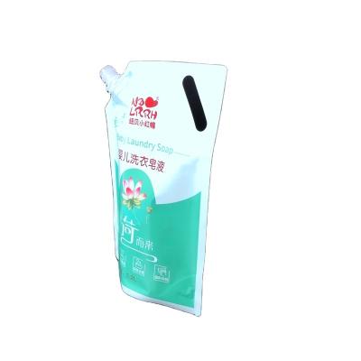 China Recyclable Portable Baby Laundry Soap Spout 1.2kg Well Sealed Vertical Bag With Handle for sale