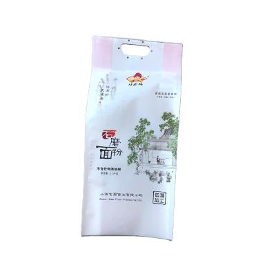 China Customized Recyclable Nine Color Graphite Flour Plastic Bag Three Sides Sealing 2.5kg Hand Pouch for sale