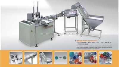 China CLOTHING Non Spill Cap Foam Liner Inserting Machine for sale