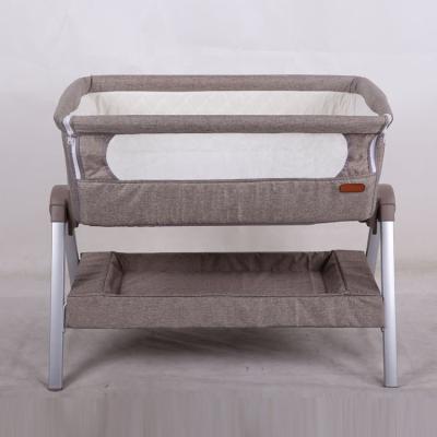 China Modern Canvas Fabric China Manufacturer Bedside Baby Cribs Comfortable Newborn Infant Crib for sale