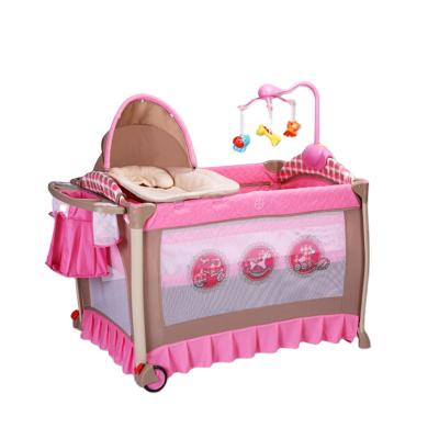 China Newborn Multi-Functional Folding Portable Baby Crib Easy Folding Baby Crib Hutch Playpen Bed Folding Swing Travel for sale