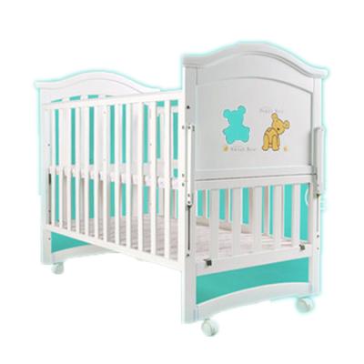 China Safe Baby European Type Flip Bed With Baby Environment Solid Wood Rocking Bed With Multifunctional Roller for sale