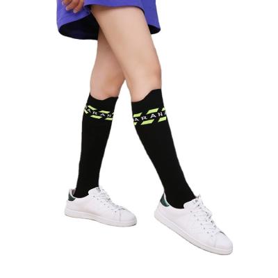 China Women Indoor and Outdoor Fashionable Casual Socks High Quality Best Selling Solid Colors Running and Walking High Knee Sports Socks for sale