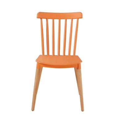 China Plastic dinng chair indoor& Factory Direct Sale Outdoor Plastic PP Beech Wooden Legs Dining Chair for sale