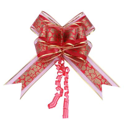 China Organza pull bows 2022 Christmas decoration organza pull ribbon hangers print pattern butterfly hand pull bow for sale