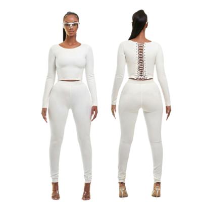 China 2021 Falls New Viable Round Neck Long Sleeve Lace Up Bandage On Back Sport Fashion Fitness Two Piece Set for sale