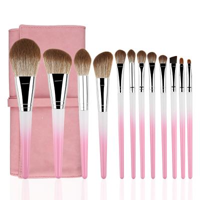 China Angular blush 12pcs eyebrow brush brocha profesional pink white maquillaje with pink makeup brush bag 2021 make up tools for sale