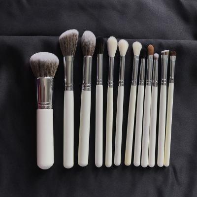 China Angular Blush White Silver Classic Brush Manufacturer Empty Makeup Brushes 12pcs Private Label Makeup Brush Set for sale