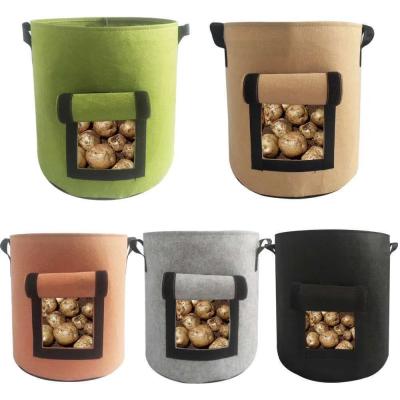 China Eco-Friendly Eco DIY Potato Grow Planter Nonwoven Fabric Tomato Plant Container Bag Flower Garden Pot Felt Vegetable Plant Grow Bag for sale